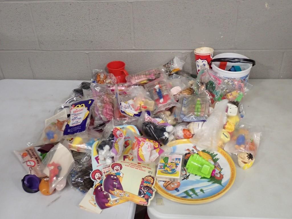 McDonald's Lot including Vintage, Happy Meal Toys, Cups, Plates, Some unopened, etc.: McDonald's Lot including Vintage, Happy Meal Toys, Cups, Plates, Some unopened, etc. All pictures are considered part of the description and should be examined carefully by bidders. Live Auctionee