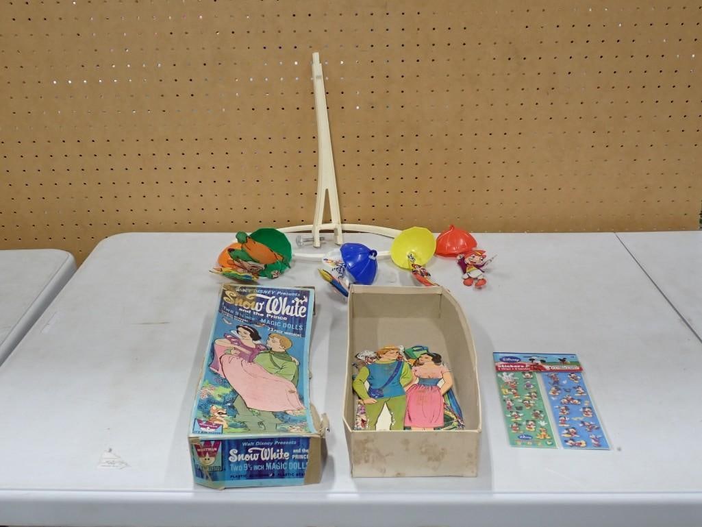 Walt Disney Lot including Whitman Magic Dolls, Stickers, Parts for Musical Crib Mobile: Walt Disney Lot including Whitman Magic Dolls, Stickers, Parts for Musical Crib Mobile All pictures are considered part of the description and should be examined carefully by bidders. Live Auctioneers