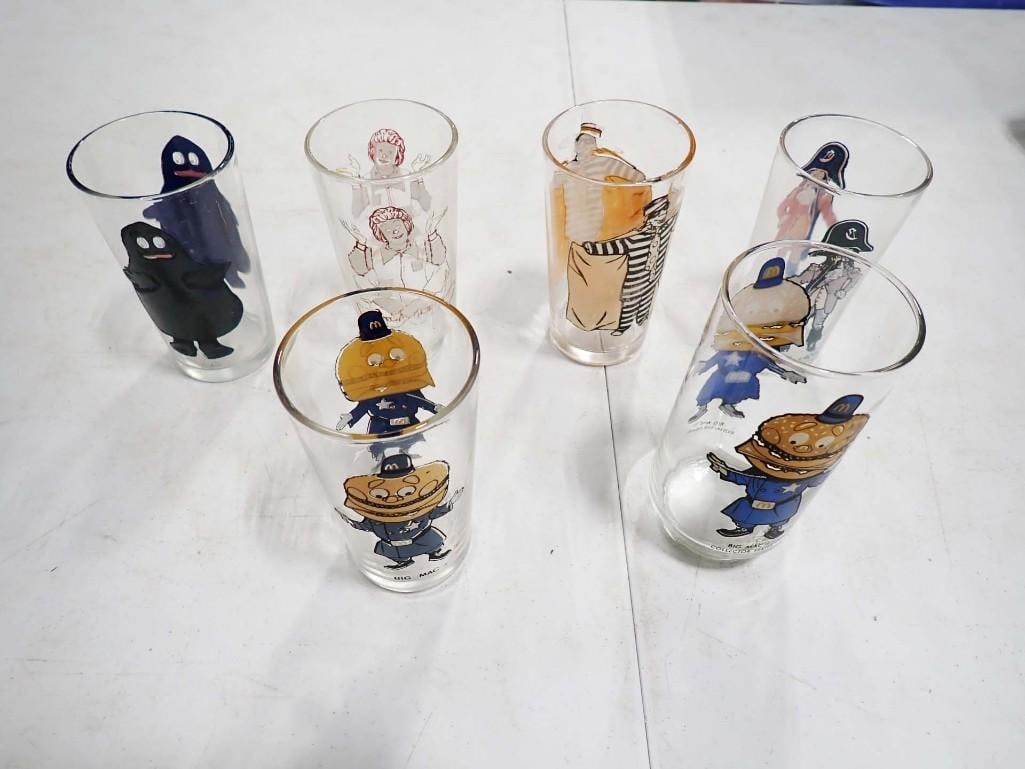 6 Vintage McDonald's Collector Glasses incl Hamburgler, Big Mac, Grimace, Ronald McDonald,: 6 Vintage McDonald's Collector Glasses incl Hamburgler, 2 Big Mac, Grimace, Ronald McDonald, Captain Crook. Condition: please see pictures. These do have some fading and paint lo