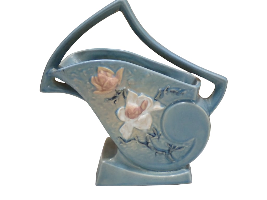 Vintage Roseville Pottery Large Magnolia Handled Vase or Planter 386-12": Vintage Roseville Pottery Large Magnolia Handled Vase or Planter 386-12" Blue All pictures are considered part of the description and should be examined carefully by bidders. Live Auctioneers is