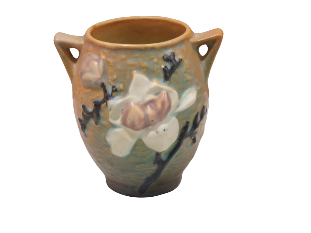 Vintage Roseville Pottery Magnolia Vase 2 Handled: Vintage Roseville Pottery Magnolia Vase 2 Handled 86-4" All pictures are considered part of the description and should be examined carefully by bidders. Live Auctioneers is now offering Live Shi