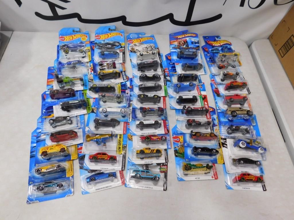 50 Hot Wheels Cars and Vehicles New in Package: 50 Hot Wheels Cars and Vehicles New in Package All pictures are considered part of the description and should be examined carefully by bidders. Live Auctioneers is now offering Live Shipping through t