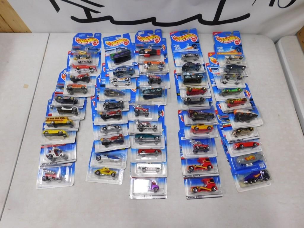 50 Hot Wheels Cars and Vehicles New in Package: 50 Hot Wheels Cars and Vehicles New in Package All pictures are considered part of the description and should be examined carefully by bidders. Live Auctioneers is now offering Live Shipping through t