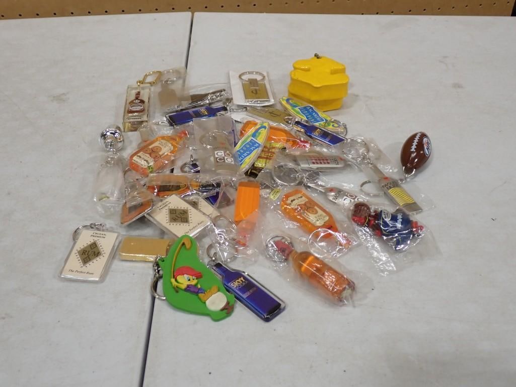 Lot of Keychains incl Advertising, Elmer Fudd, Football, Liquor Advertising, etc: Lot of Keychains incl Advertising, Elmer Fudd, Football, Liquor Advertising, etc All pictures are considered part of the description and should be examined carefully by bidders. Live Auctioneers is