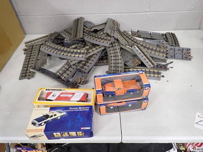Train Lot including Lots of MTH O Scale Tracks, Bachmann HO Train, Two Lionel Die-Cast RMT 1955: Train Lot including Lots of MTH O Scale Tracks, Bachmann HO Train, Two Lionel Die-Cast Trucks, and a Corgi Dodge Monaco All