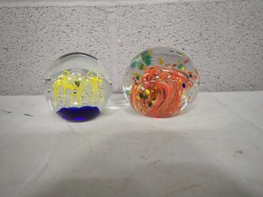 Two Art Glass Paperweights - Confetti & Swirl, and a yellow and blue swirl