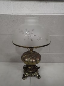 Vintage electrified hurricane oil lamp, with brass base and a frosted glass shade. 