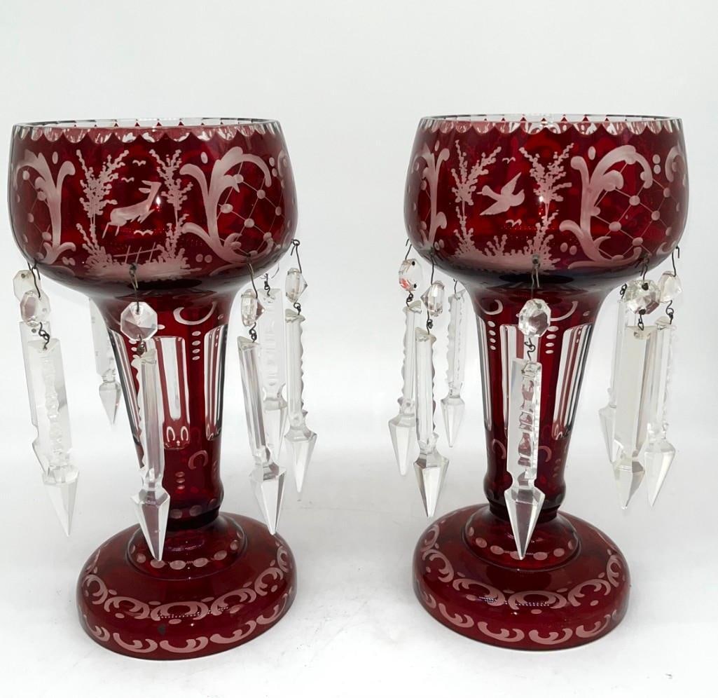 Antique Pair of Bohemian Ruby Red Etched Glass or Cut to Clear Mantle Lusters Candleholders: Antique Pair of Bohemian Ruby Red Etched Glass or Cut to Clear Mantle Lusters Candleholders. 6"x10.5" No chips on the lusters, possible small chips on the crystals. All pictures a