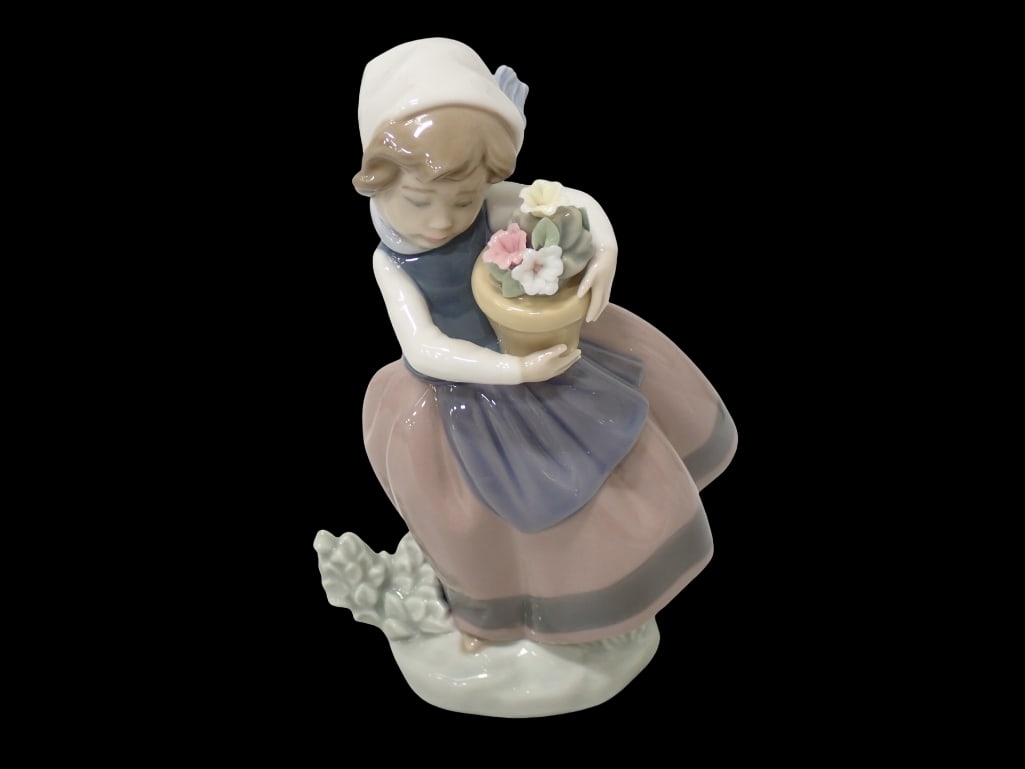 Lladro #5223 Spring is Here Porcelain Figurine: Lladro #5223 Spring is Here Porcelain Figurine. 7" tall. Great condition. No box. All pictures are considered part of the description and should be examined carefully by bidders