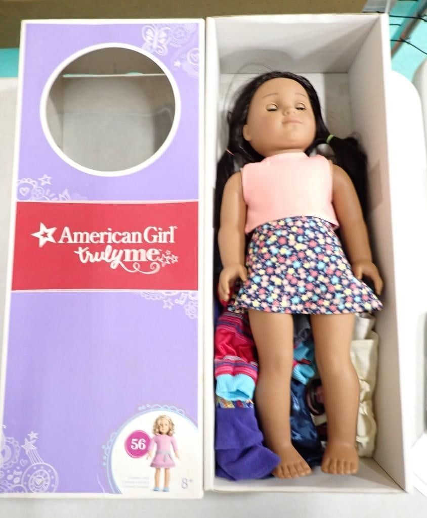 American Girl Truly Me Doll with some clothes and Box: American Girl Truly Me Doll with some clothes and Box All pictures are considered part of the description and should be examined carefully by bidders. Live Auctioneers is now offering Live Shipping th
