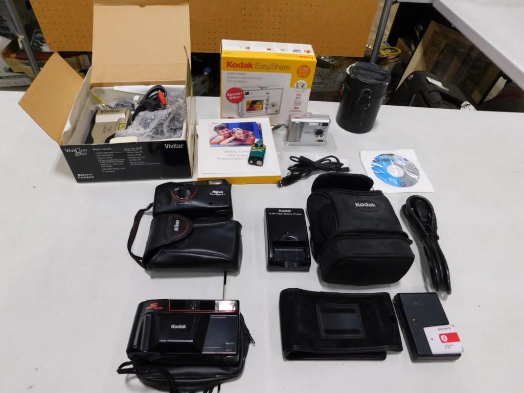 Camera Lot including Kodak, Nikon, Vivitar, Digital, Film, etc: Camera Lot including Kodak, Nikon, Vivitar, Digital, Film, etc All pictures are considered part of the description and should be examined carefully by bidders. Live Auctioneers is now offering Live Sh