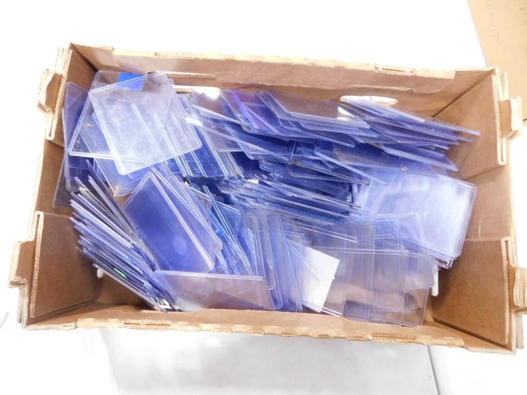 Lot of Plastic Sleeves for Sports Cards or Trading Cards: Lot of Plastic Sleeves for Sports Cards or Trading Cards All pictures are considered part of the description and should be examined carefully by bidders. Live Auctioneers is now offering Live Shippi