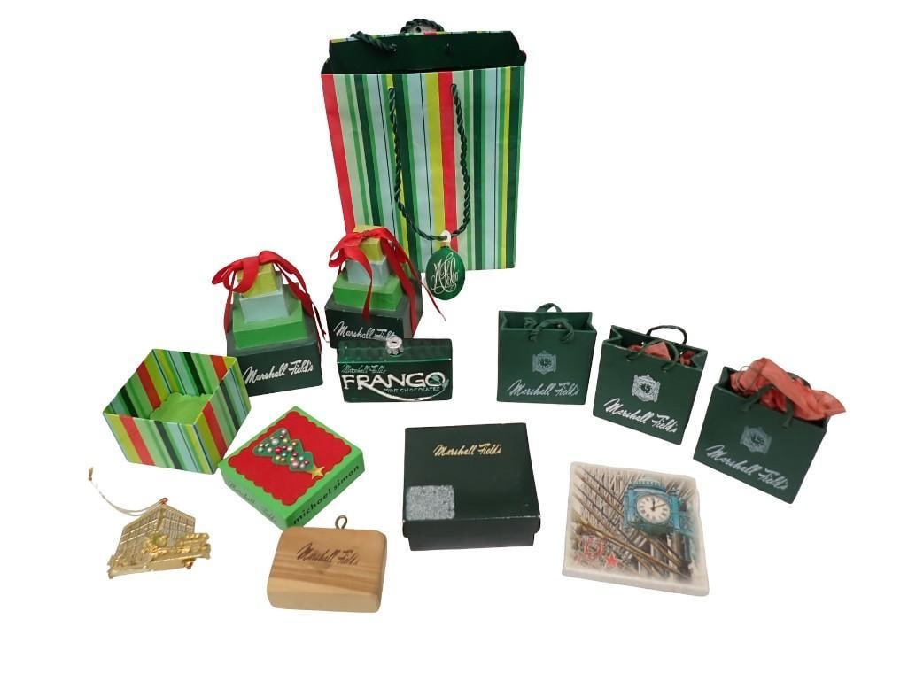 Collection of Marshall Fields Christmas ornaments and collectibles; Frango mint ornament, wrapped pr: Collection of Marshall Fields Christmas ornaments and collectibles; Frango mint ornament, wrapped presents, gift bags, coaster, boxes and gift bag All pictures are considered part of the description a