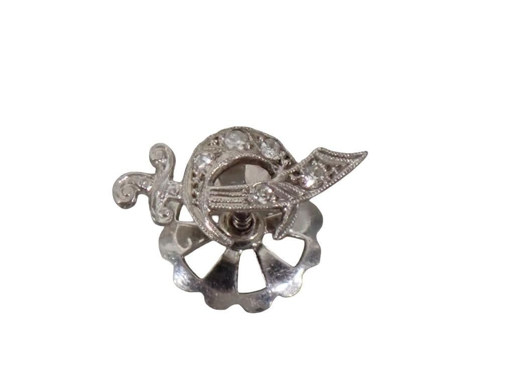 Diamond and 14kt white gold Fraternal order Masonic scimitar diamond lapel screw lapel button. Rever: Diamond and 14kt white gold Fraternal order Masonic scimitar diamond lapel screw lapel button. Reverse of pin and screwback are both stamped 14kt All pictures are considered part of the description an