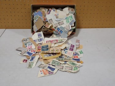 Box full of canceled Stamps including International