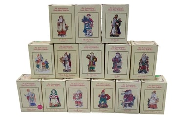 Lot of 14 The International Santa Claus Collection Resin Figures with Original Boxes