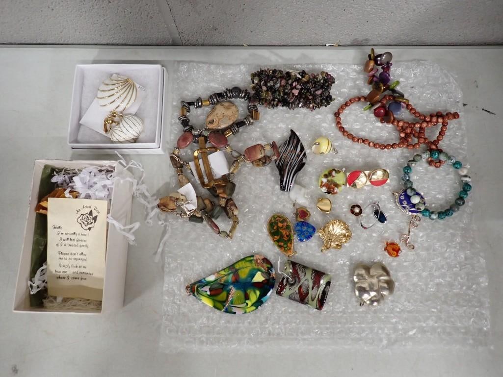 Lot of assorted Costume Jewelry including Earrings, Necklaces, Bracelets, Handmade, Vintage, etc.: Lot of assorted Costume Jewelry including Earrings, Necklaces, Bracelets, Handmade, Vintage, etc. All pictures are considered part of the description and should be examined carefully by bidders. Live