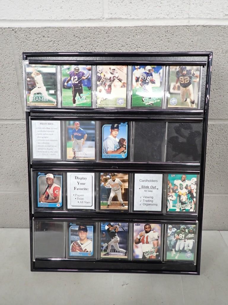 Sports and Trading Card Wall Frames with some Football and Baseball Cards: Sports and Trading Card Wall Frames with some Football and Baseball Cards All pictures are considered part of the description and should be examined carefully by bidders. Live Auctioneers is now offer