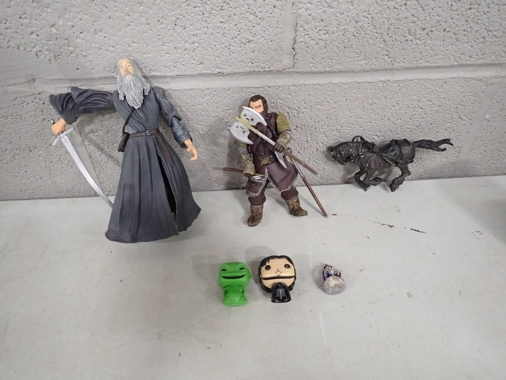 Assorted Action Figures including Lord of the Rings, Gandolf, Gimli, Funko Pop: Assorted Action Figures including Lord of the Rings, Gandolf, Gimli, Funko Pop All pictures are considered part of the description and should be examined carefully by bidders. Live Auctioneers is now