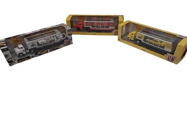 3 M2 Machines Die Cast Hauler Trucks each with a Die Cast Car New in Boxes