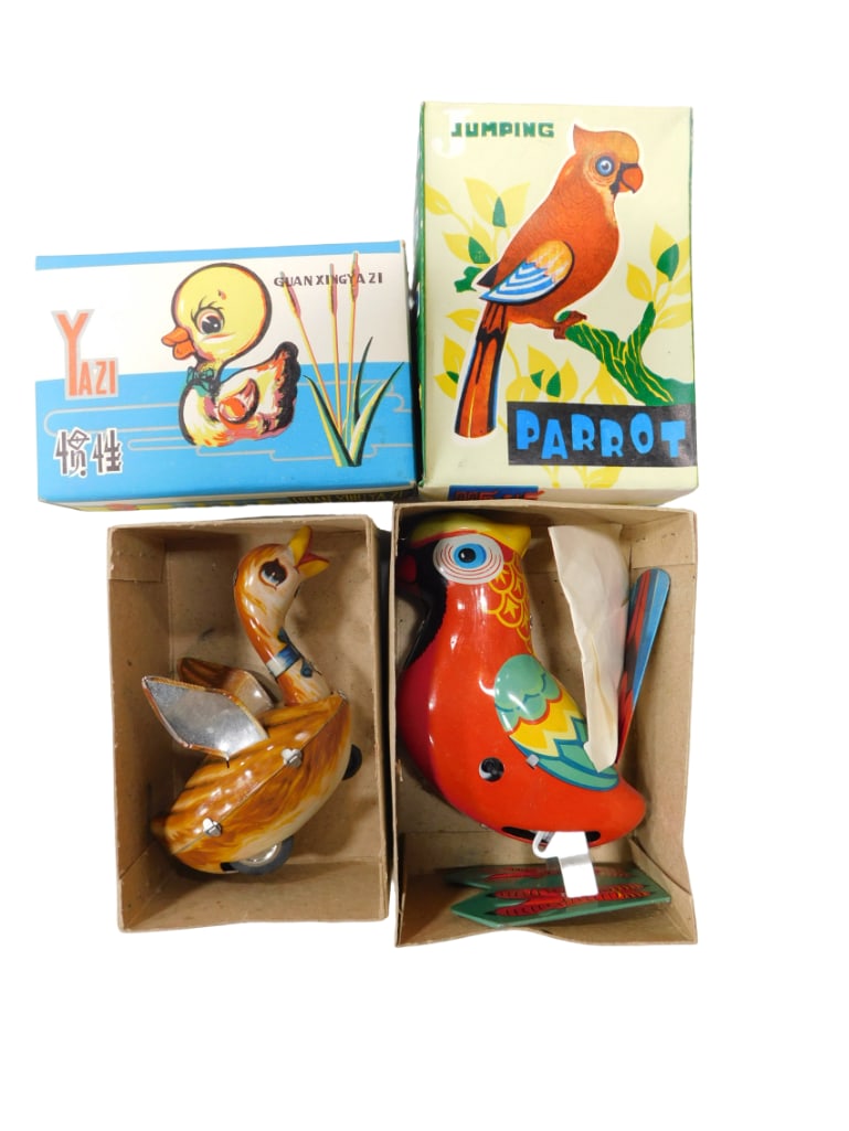 2 Vintage Tin Toys NOS New Old Stock incl Yazi Friction Powered Duck and Wind Up Tin Toy Parrot: 2 Vintage Tin Toys NOS New Old Stock incl Yazi Friction Powered Duck and Wind Up Tin Toy Parrot All pictures are considered part of the description and should be examined carefully by bidders. Live
