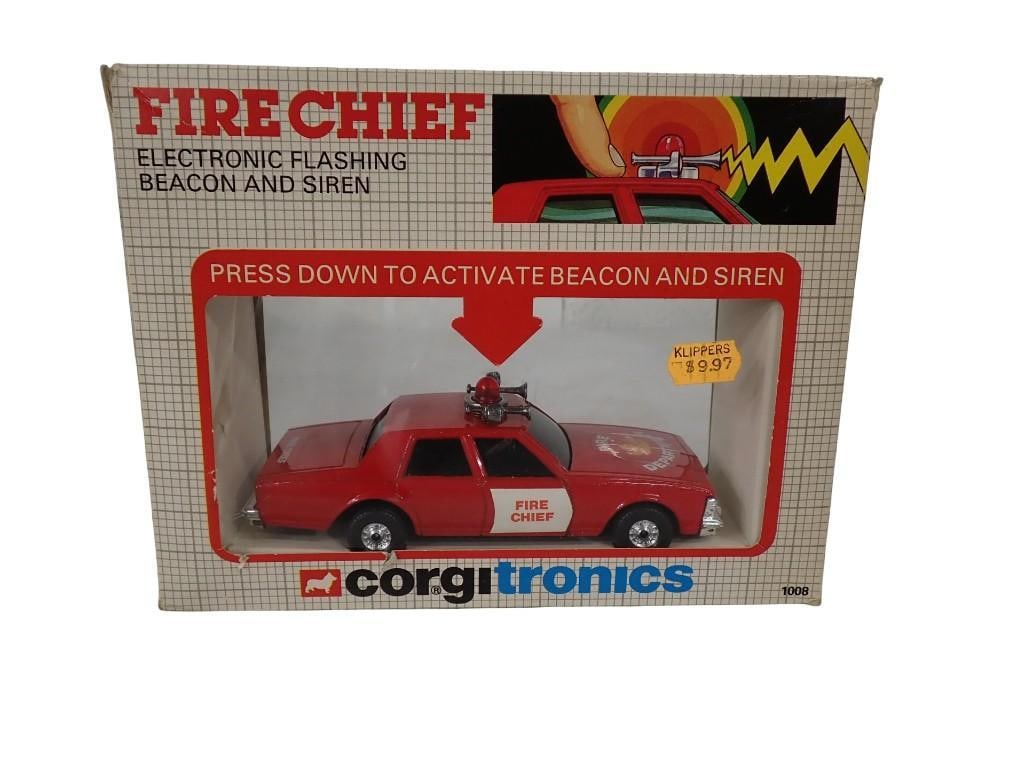 Corgitronics Fire Chief Toy Car with Electronic Flashing Beacon and Siren in Original Box: Corgitronics Fire Chief Toy Car with Electronic Flashing Beacon and Siren in Original Box All pictures are considered part of the description and should be examined carefully by bidders. Live Auctione
