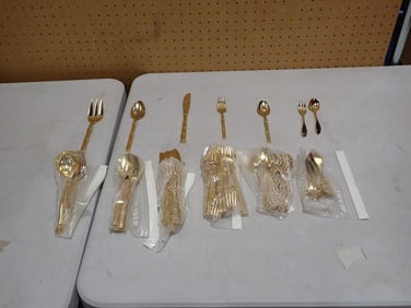 Lot of gold tone flatware