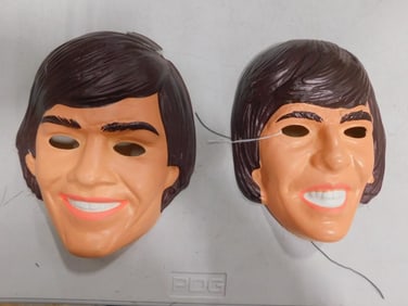 Two vintage Vacuform Halloween Masks featuring the Monkees - Davy Jones