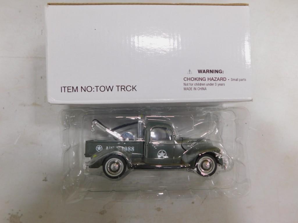 Die Cast Model Military Tow Truck: Die Cast Model Military Tow Truck All pictures are considered part of the description and should be examined carefully by bidders. Live Auctioneers is now offering Live Shipping through them. This is 