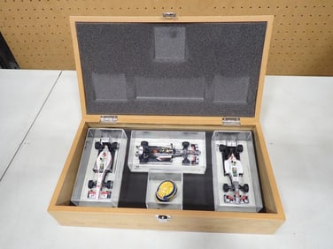 Display Case with Three F1 Race cars - Sergio Perez- Sauber C30, Esteban Gutierrez - Sauber 32 and