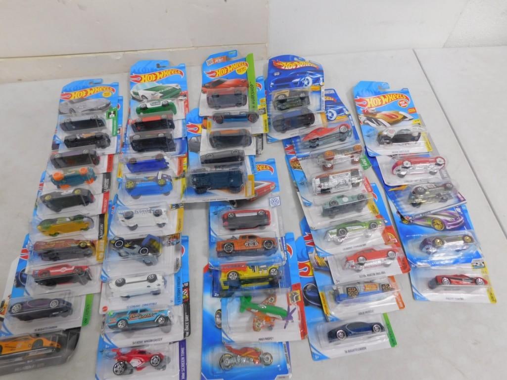 Lot of Approximately 45 New in Package Hot Wheels Cars All pictures are considered part of the desc: Lot of Approximately 45 New in Package Hot Wheels Cars All pictures are considered part of the description and should be examined carefully by bidders. Live Auctioneers is now offering Live Shipping t