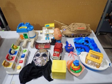 Toy Lot including Mr. Potato Head, Fisher Price, Pop Up Pets, Tonka, etc.