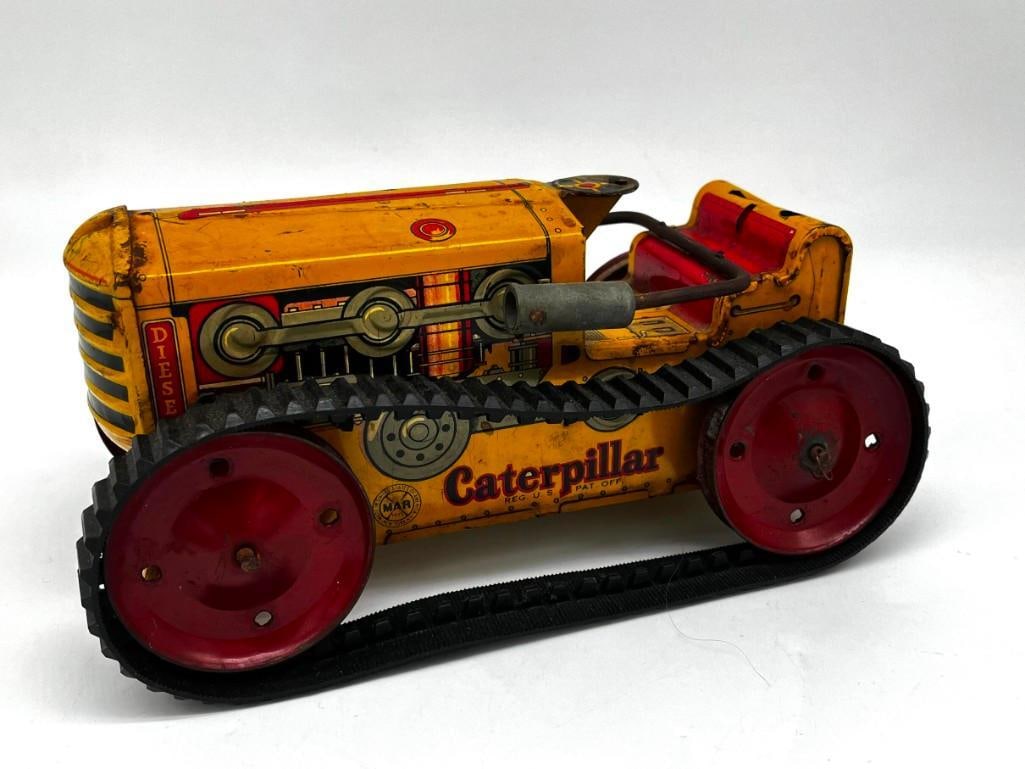 Vintage Marx Tin Litho Caterpillar Tractor Toy: Vintage Marx Tin Litho Caterpillar Tractor Toy Condition: as is, missing a few components 10" All pictures are considered part of the description and should be examined carefully 