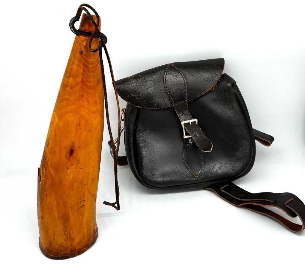 Carved Calling Horn and Leather Ammunition Satchel Bag with Strap: Carved Calling Horn and Leather Ammunition Satchel Bag with Strap All pictures are considered part of the description and should be examined carefully by bidders. Live Auctioneers is now offering Live