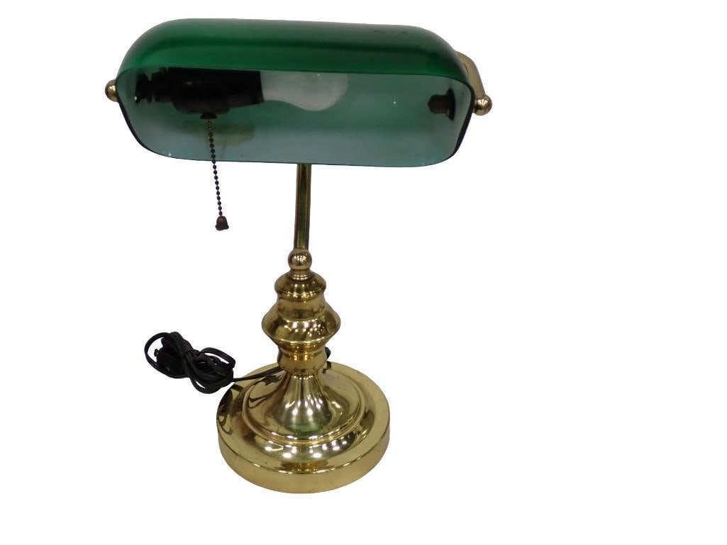 Vintage Green Glass Shade Bankers Desk Lamp: Vintage Green Glass Shade Bankers Desk Lamp tested working, small crack on brass All pictures are considered part of the description and should be examined carefully by bidders. Live Auctioneers