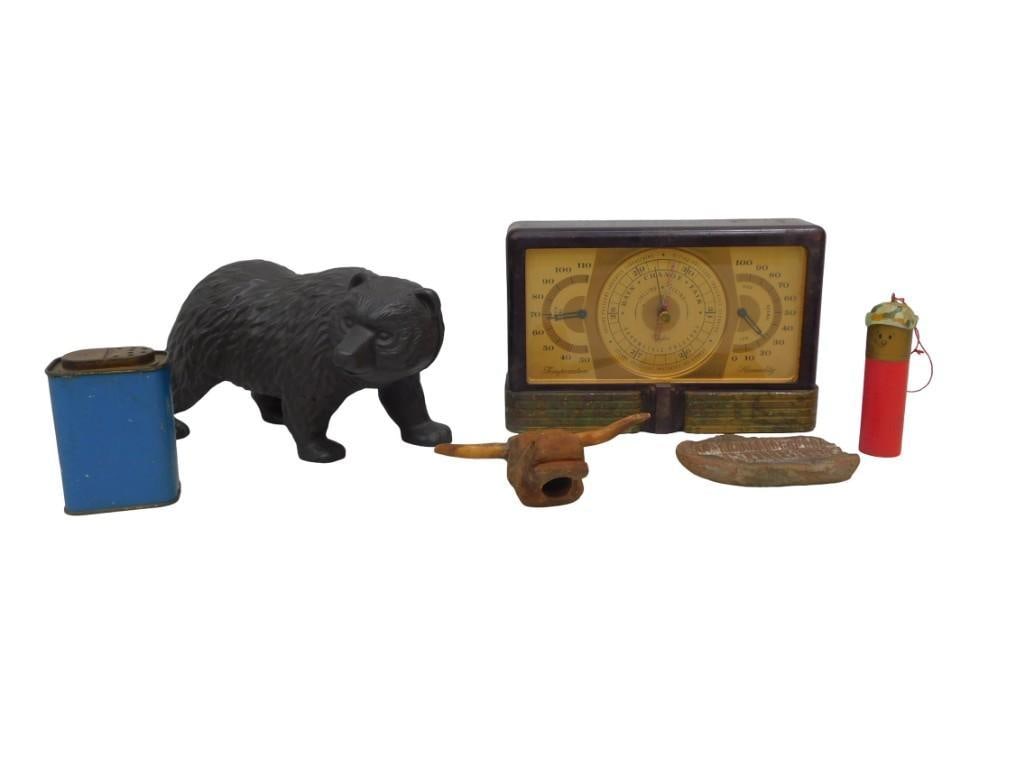 Cast Iron Bear, Taylor Hygrometer, Fossil & More: Cast Iron Bear, Taylor Hygrometer, Fossil & More All pictures are considered part of the description and should be examined carefully by bidders. Live Auctioneers is now offering Live Shipp