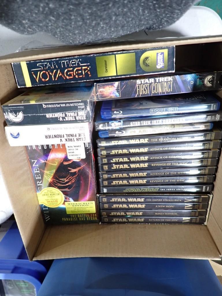 Lot of Star Wars & Star Trek DVD's / VHS - Some VHS Sealed: Lot of Star Wars & Star Trek DVD's / VHS - Some VHS Sealed All pictures are considered part of the description and should be examined carefully by bidders. Live Auctioneers is now