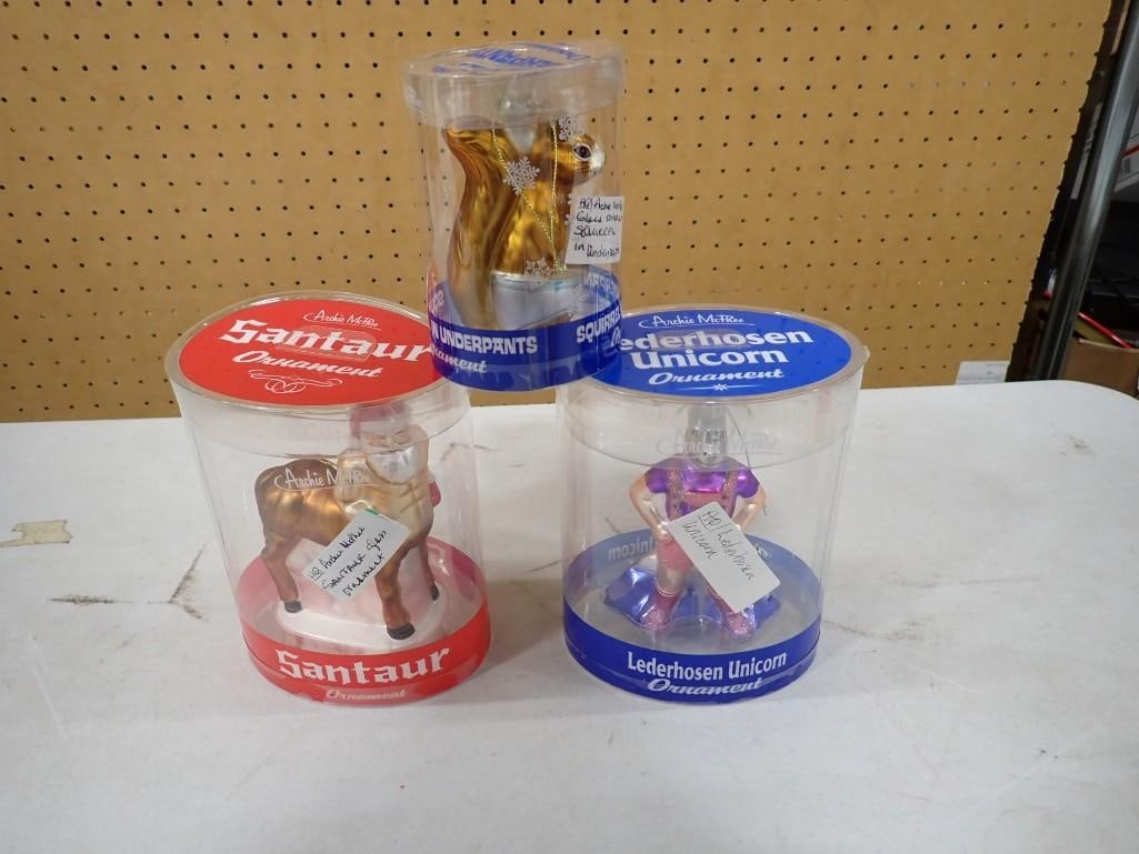 3 Archie McPhee Ornaments incl Squirrel in Underpants Ornament, Lederhosen Unicorn Ornament, and San: Lot of 3 Archie McPhee Ornaments incl Squirrel in Underpants Ornament, Lederhosen Unicorn Ornament, and Santaur Ornament. All in original packages. All pictures are considered part of the