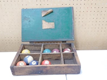Vintage or antique Wooden Box with some old Pool Balls