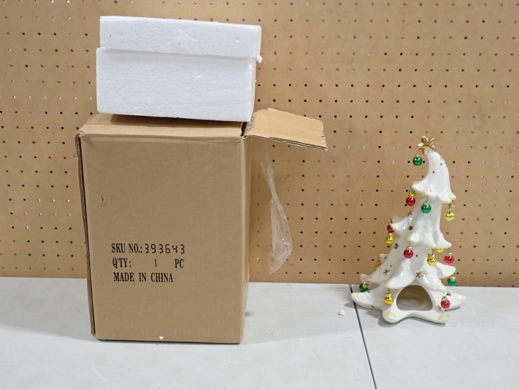Ceramic Christmas Tree Display with original box: Ceramic Christmas Tree Display with original box All pictures are considered part of the description and should be examined carefully by bidders. Live Auctioneers is now offering Live Shipping through