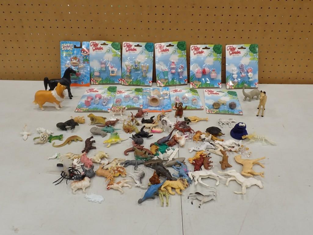 Lot of Small Toys incl Plastic Horses, Plastic Dinosaurs, New in Package Fairy Garden Figures, Etc: Lot of Small Toys incl Plastic Horses, Plastic Dinosaurs, Plastic Animals, New in Package Fairy Garden Figures, Etc All pictures are considered part of the description and should be examined carefull