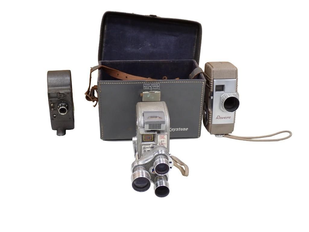 Lot of 3 Vintage Movie Cameras: Lot of 3 Vintage Movie Cameras. Nice lot. All still work. All pictures are considered part of the description and should be examined carefully by bidders. Live Auctioneers is now offerin
