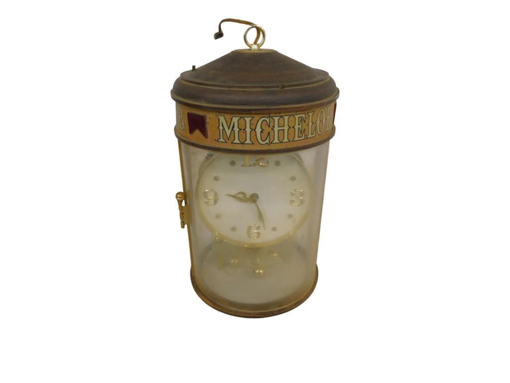 Michelob Beer Hanging Bar Clock - Untested: Michelob Beer Hanging Bar Clock - Untested The cord does not fit a standard socket - it looks like it needs some sort of adapter. All pictures are considered part of the description and should be exam