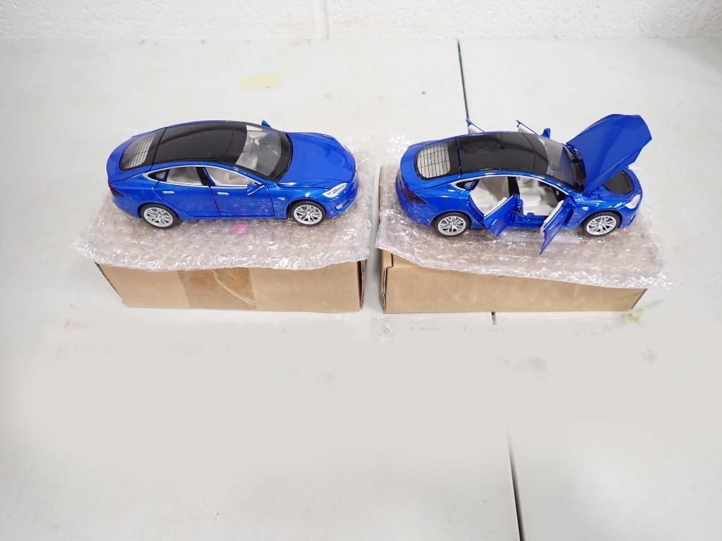 2 Toy Car Tesla Model S Blue New in Box These Light Up and Make Engine Sounds: Lot of 2 Toy Car Tesla Model S Blue New in Box . They are new in box, These make an engine sound and light up. All pictures are considered part of the description and should be examined carefully by b