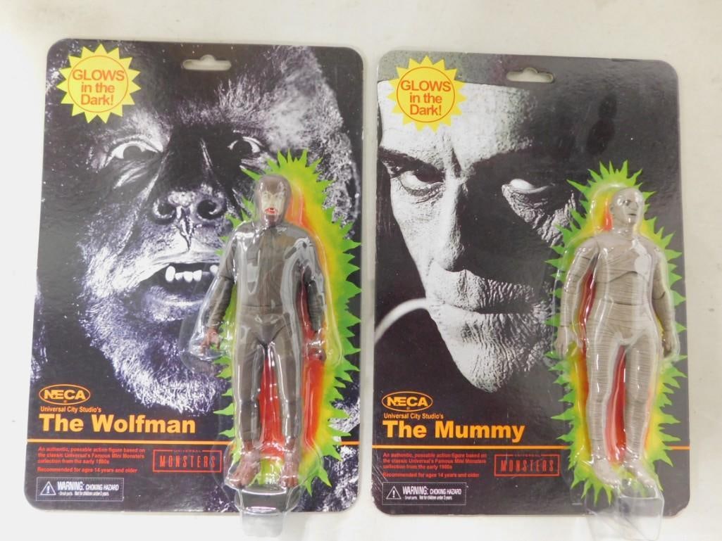 Neca The Wolfman and The Mummy Glow in the Dark Action Figures New on Cards: Neca The Wolfman and The Mummy Glow in the Dark Action Figures New on Cards All pictures are considered part of the description and should be examined carefully by bidders. Live Auctioneers is now off