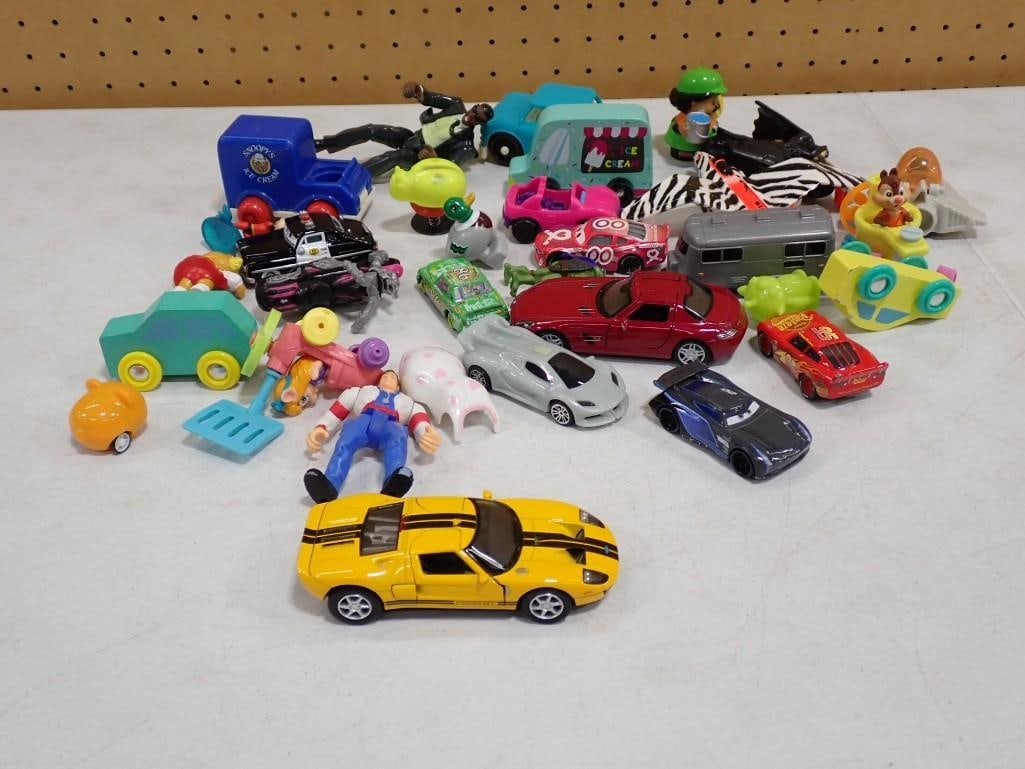 Lot of assorted Toys and Cars, etc. Including Snoopy, Pixar Cars Lightning McQueen, MIB Agent J, etc (1 of 8)