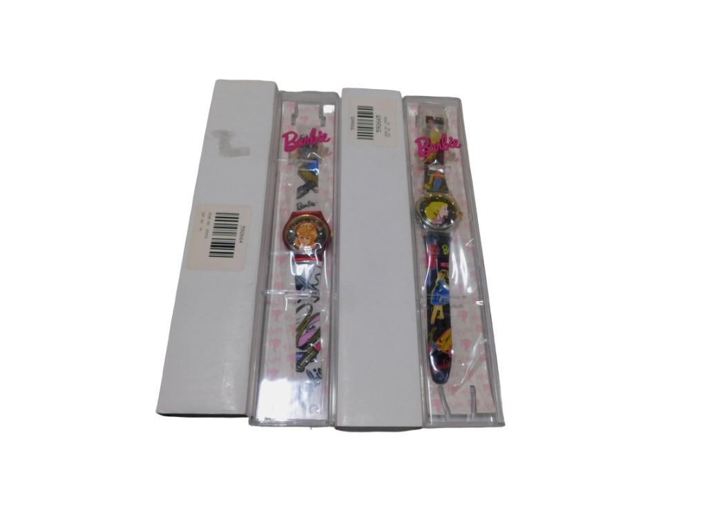 Two Vintage 1990's Barbie Wrist Watches: Two Vintage 1990's Barbie Wrist Watches All pictures are considered part of the description and should be examined carefully by bidders. Live Auctioneers is now offering Live Shipping through them