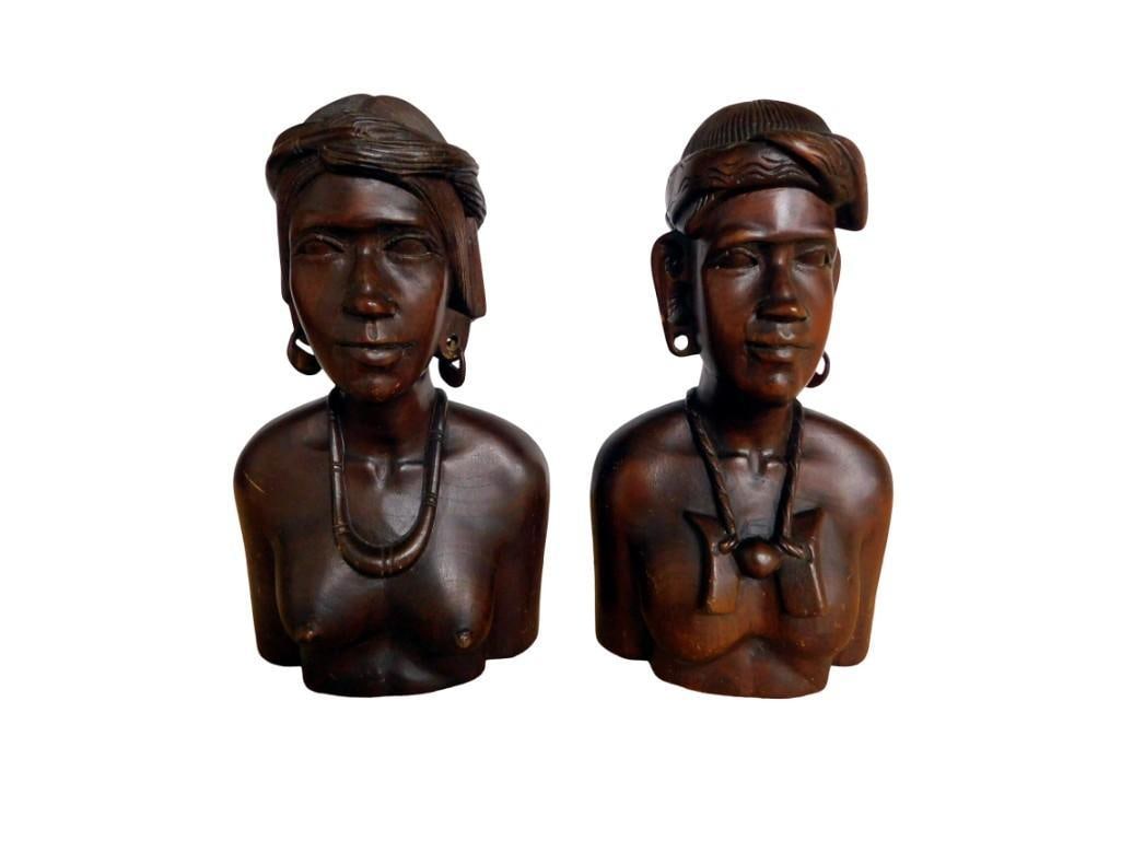 2 Carved Wood Native Tribal Busts or Statues: 2 Carved Wood Native Tribal Busts or Statues All pictures are considered part of the description and should be examined carefully by bidders. Live Auctioneers is now offering Live Shipping through t