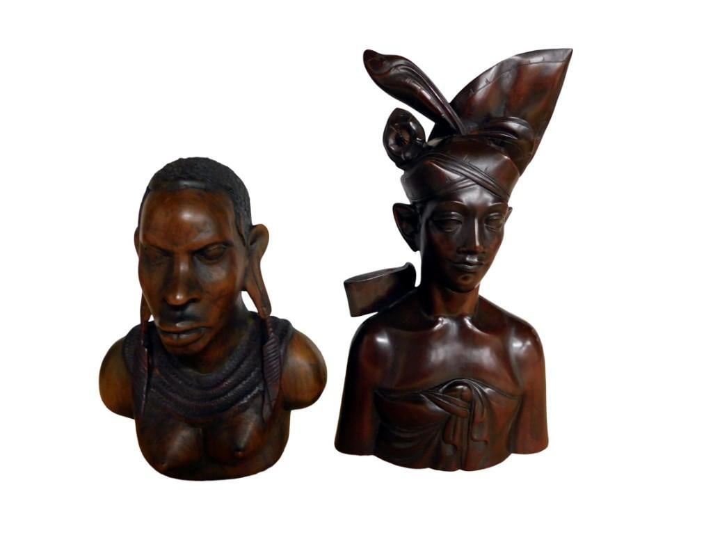 2 Carved Wood Native Tribal Busts or Statues: 2 Carved Wood Native Tribal Busts or Statues. 1 is signed on the bottom All pictures are considered part of the description and should be examined carefully by bidders. Live Auctioneers is now