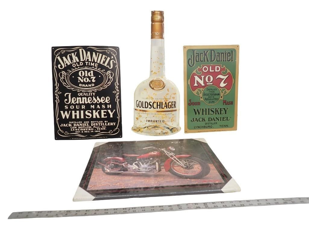 3 Metal Bar Signs and a Framed Motorcycle Print Signs Include Goldschlager, Jack Daniels and Jack Da: 3 Metal Bar Signs and a Framed Motorcycle Print Signs Include Goldschlager, Jack Daniels and Jack Daniel All pictures are considered part of the description and should be examined carefully by